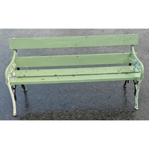 482 - Wrought iron two seater garden bench in good usable condition painted green#510