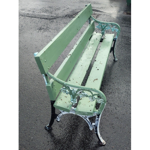 482 - Wrought iron two seater garden bench in good usable condition painted green#510