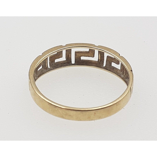 7 - A 585 stamped ring with key design shaft.  Size O, weight 1.9g approx.#7