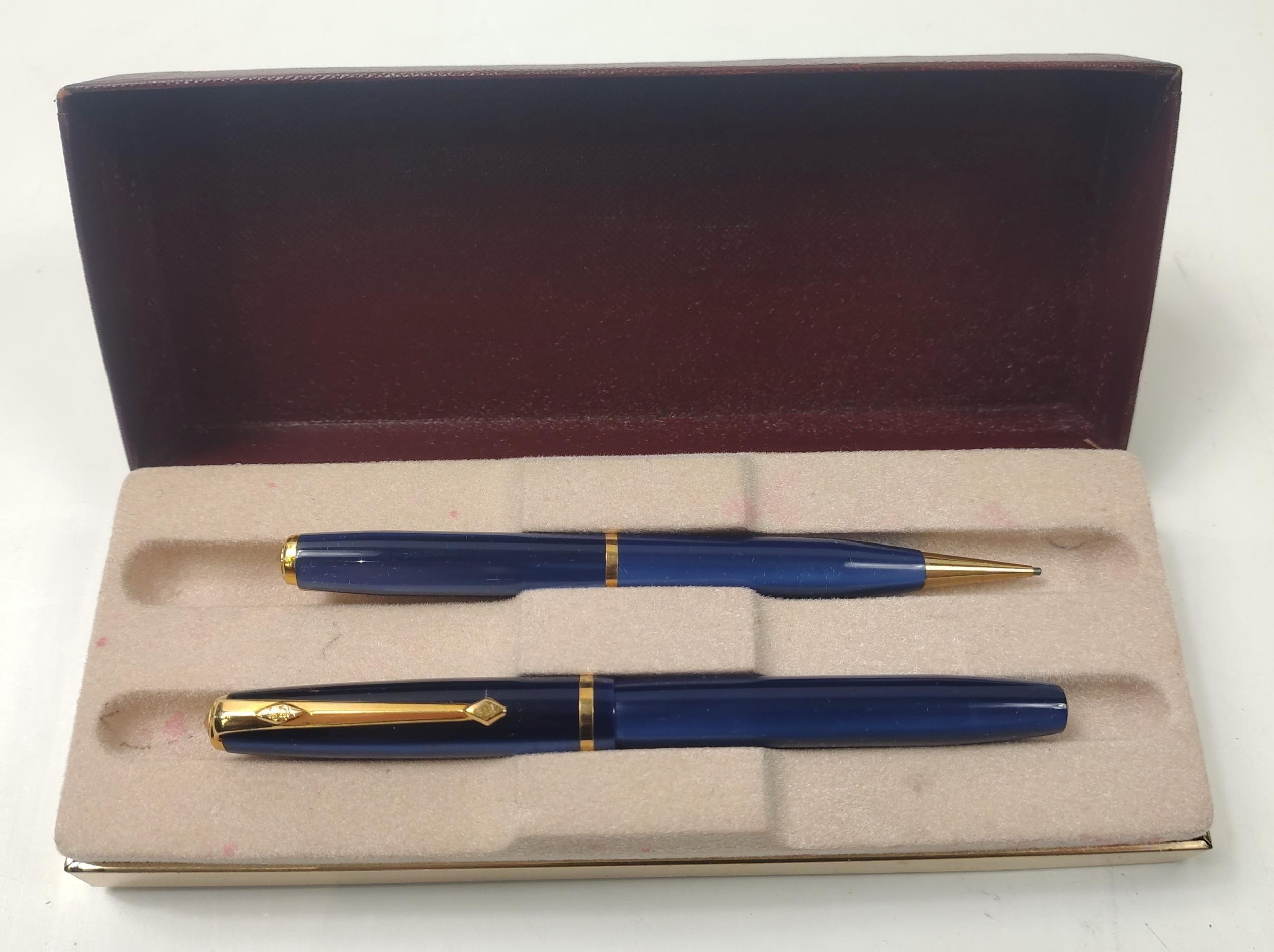 A CONWAY STEWART box with unmatched 54 small blue irridescent pair ...