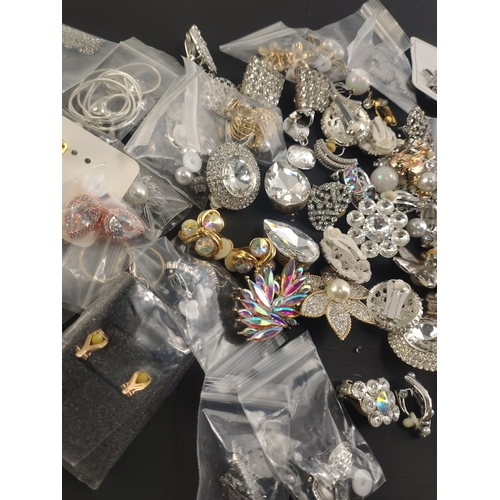 161 - A large bag of new and unused BLING costume jewellery to include earrings mainly.#20