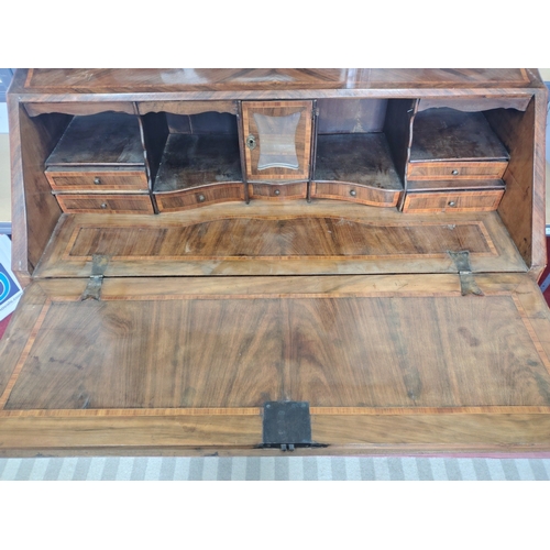 275 - A stylish three drawer bow front bureau / writing desk.  Came from a substantial property in Italy. ... 