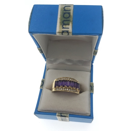 30 - Lovely unmarked yellow metal ring (purchased in America and tests as 14ct) with seven Amethyst stone... 