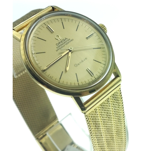 65 - OMEGA GENEVE 18ct Gold gents watch with 18ct gold flat stamped ribbon bracelet. Total gross weight 6... 