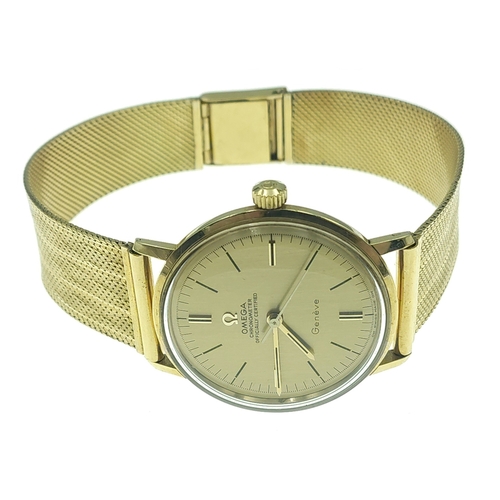 65 - OMEGA GENEVE 18ct Gold gents watch with 18ct gold flat stamped ribbon bracelet. Total gross weight 6... 