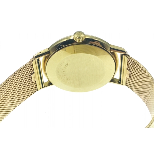 65 - OMEGA GENEVE 18ct Gold gents watch with 18ct gold flat stamped ribbon bracelet. Total gross weight 6... 