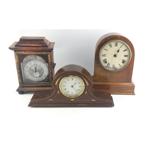 243 - An American ANSONA mantle clock (A/F), a brass movement Swiss Mantle clock and one other modern batt... 