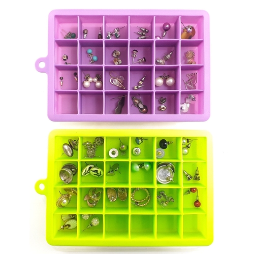 192 - A good collection of earrings in two storage boxes. Over twenty five pairs well stored.