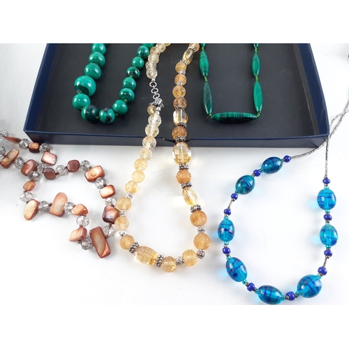 205 - A collection of coloured glass jewellery, to include a BLUE GLASS MURANO bracelet - to include TIGER... 