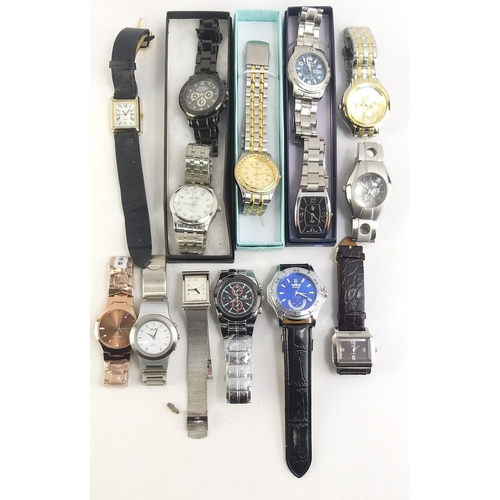 215 - Over a dozen dress watches. Assorted makes and types. Batteries may be required.