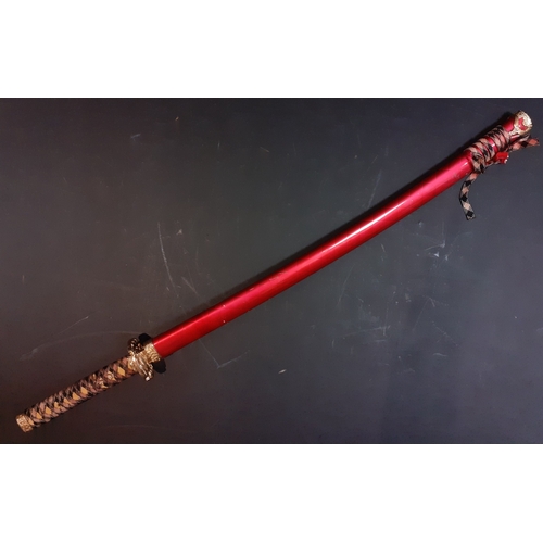 238 - A large Katana / Samurai sword in decorative metal sheath. 70cm blade, the whole 102cm approx. Blade... 
