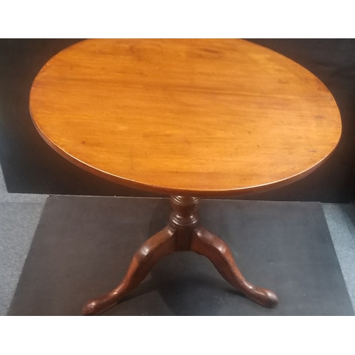 269 - Georgian mahogany tilt top table 75cm in diameter.  Good clean working condition. A classy piece.