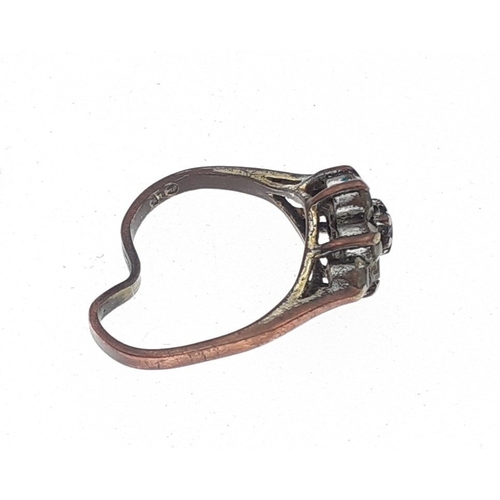 29 - A 375 stamped bent ring with faux diamonds. Gross weight 2g approx