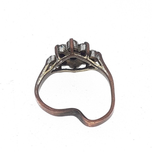 29 - A 375 stamped bent ring with faux diamonds. Gross weight 2g approx