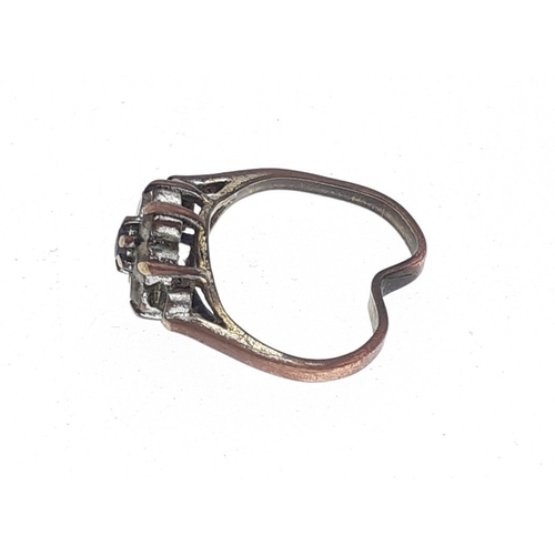 29 - A 375 stamped bent ring with faux diamonds. Gross weight 2g approx