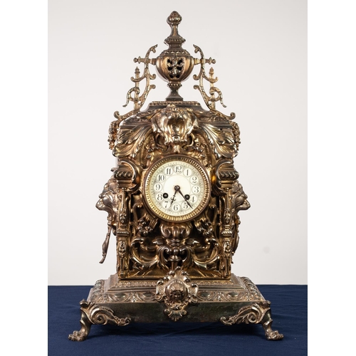 49 - IMPRESSIVE EARLY TWENTIETH CENTURY LARGE BRASS MANTLE CLOCK, the 4” Arabic dial powered by an eight ... 