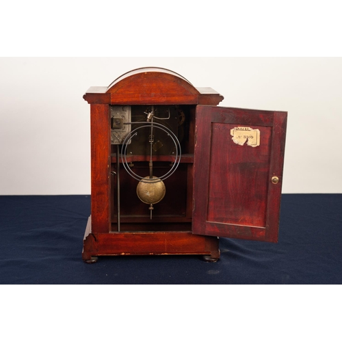 26 - EDWARDIAN INLAID MAHOGANY MANTLE CLOCK, the 4 ½” enamelled Arabic dial powered by an eight day movem... 