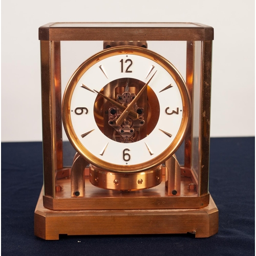 22 - JAEGER LeCOULTRE COPPER PLATED ATMOS CLOCK, serial number: 57910, the white enamelled chapter ring w... 