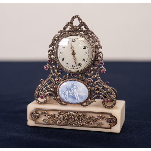 23 - LATE NINETEENTH CENTURY CONTINENTAL SILVER COLOURED METAL AND MARCASITE MINIATURE MANTEL CLOCK, the ... 