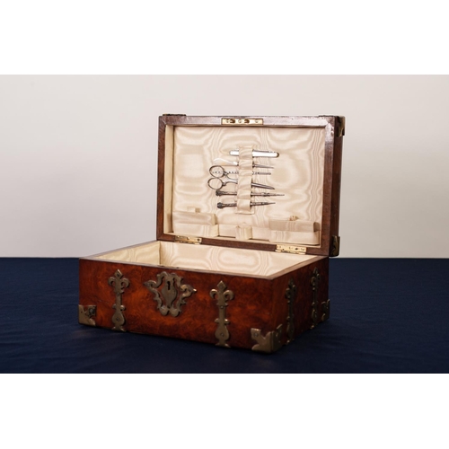 61 - VICTORIAN GOTHIC REVIVAL BRASS BOUND BURR WALNUT SEWING BOX, of oblong from, the interior lined and ... 