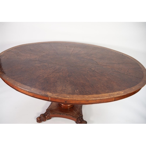 132 - EARLY NINETEENTH CENTURY FIGURED AND BURR WALNUT BREAKFAST TABLE, the moulded oval tilt-top with dia... 