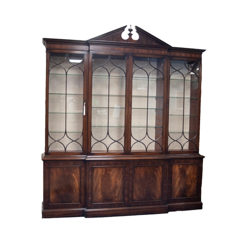 164 - MODERN GEORGE III STYLE MAHOGANY BREAKFRONTED LIBRARY BOOKCASE, the moulded cornice surmounted by an... 