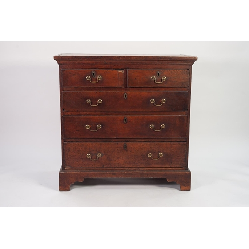 111 - GEORGE III OAK CHEST OF DRAWERS, the moulded oblong top above two short and three long oak lined and... 