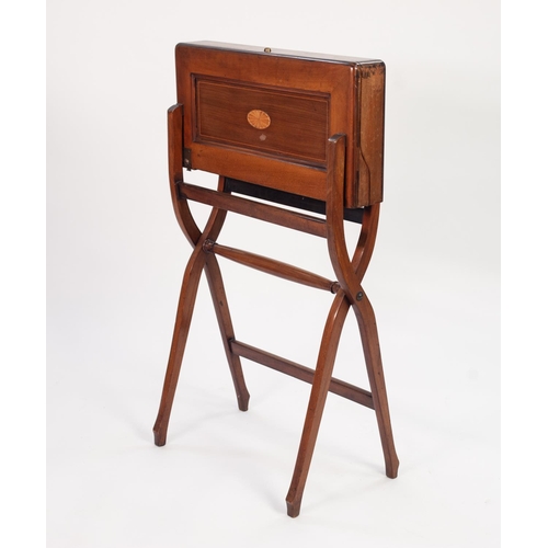 127 - EDWARDIAN INLAID MAHOGANY FOLDING WRITING TABLE, the compartmented brown leather lined interior with... 