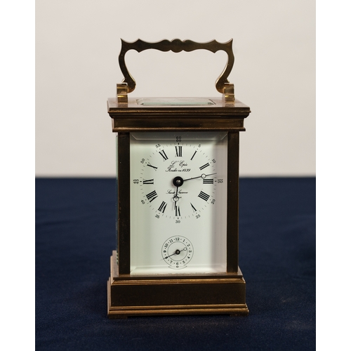 45 - A MODERN FRENCH BRASS CASED CARRIAGE CLOCK with alarm, the white enamel Roman dial inscribed 'L'Epee... 