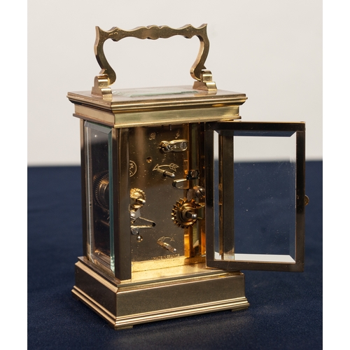 45 - A MODERN FRENCH BRASS CASED CARRIAGE CLOCK with alarm, the white enamel Roman dial inscribed 'L'Epee... 