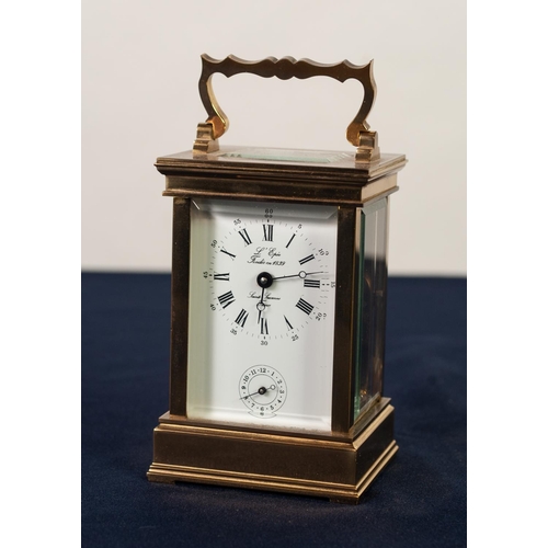 45 - A MODERN FRENCH BRASS CASED CARRIAGE CLOCK with alarm, the white enamel Roman dial inscribed 'L'Epee... 