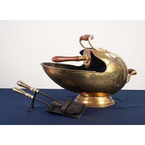 73 - A LATE VICTORIAN/EDWARDIAN BRASS HELMET SHAPED COAL SCUTTLE, together with an original WOODEN HANDLE... 