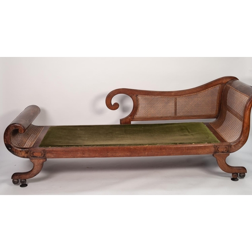 161 - PROBABLY COLONIAL REGENCY TEAKWOOD AND CANED SCROLL END CHAISE LONGUE, with cane work back and seat,... 