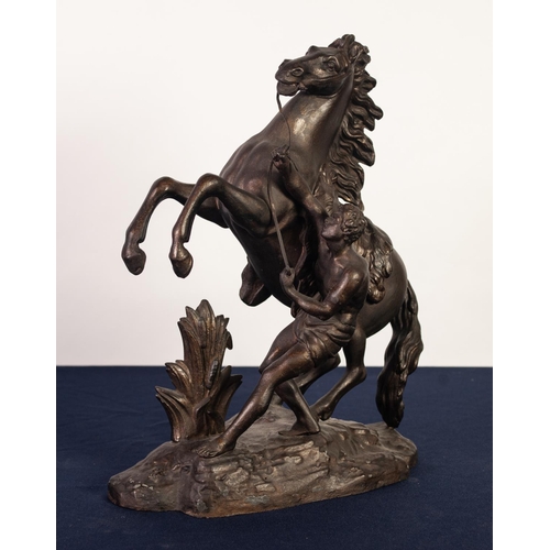 83 - MARLEY HORSE, CAST SPELTER GROUP, dark patination with gilt dusted highlights, 16” (40.7cm) high