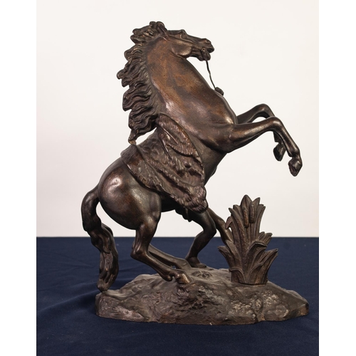 83 - MARLEY HORSE, CAST SPELTER GROUP, dark patination with gilt dusted highlights, 16” (40.7cm) high