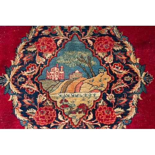 17 - KIRMAN PERSIAN RUG, the large lozenge shaped medallion with pendants and decorated in a central pict... 