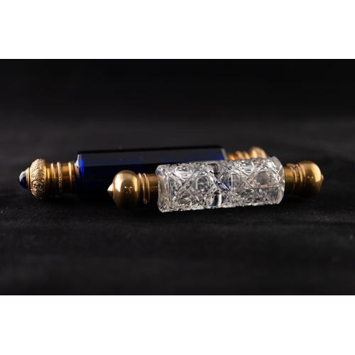 20 - A VICTORIAN FACETED SAPPHIRE BLUE GLASS GILT METAL MOUNTED DOUBLE ENDED SCENT BOTTLE, 6