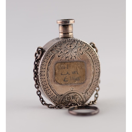 25 - AN EDWARDIAN SILVER GREEN-STONE INSET AND BLACK JAPANNED HORSE-SHOE SHAPED SCENT FLASK, centred with... 