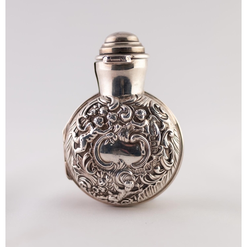 10 - AN EDWARDIAN SILVER HINGED SCENT BOTTLE HOLDER WITH HINGED COVER, stamped with cherubs amongst scrol... 