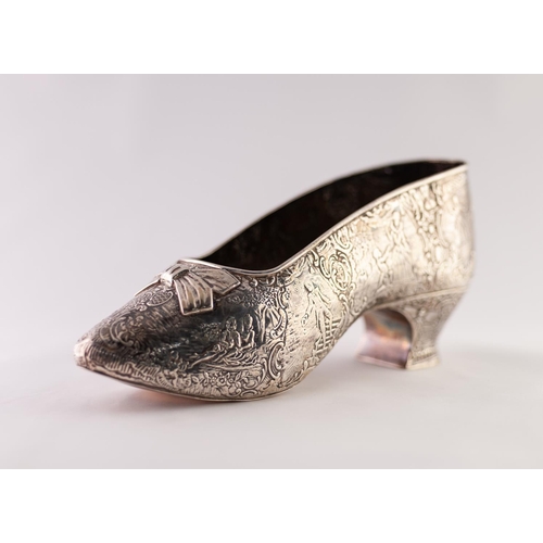 53 - A LATE 19TH CENTURY FRENCH OR LOW COUNTRIES SILVER COLOURED METAL SHOE FORM FLOWER HOLDER, stamped a... 