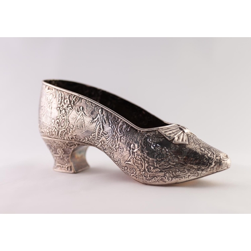 53 - A LATE 19TH CENTURY FRENCH OR LOW COUNTRIES SILVER COLOURED METAL SHOE FORM FLOWER HOLDER, stamped a... 