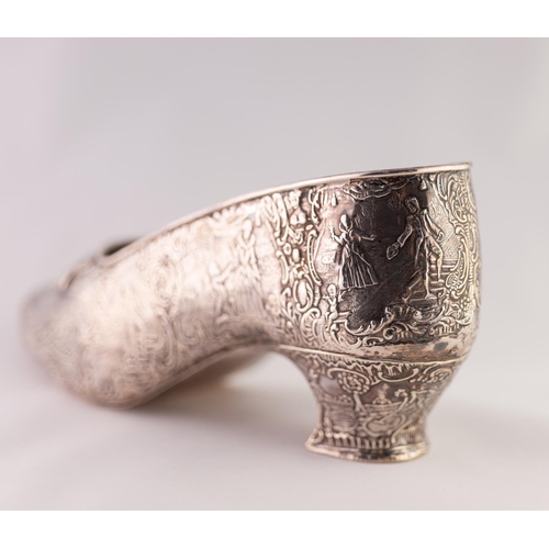 53 - A LATE 19TH CENTURY FRENCH OR LOW COUNTRIES SILVER COLOURED METAL SHOE FORM FLOWER HOLDER, stamped a... 