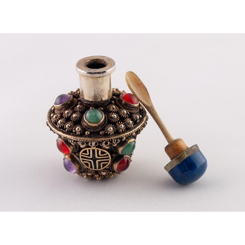 33 - A SMALL GILT METAL CABOCHON STONE ENCRUSTED SNUFF BOTTLE, the blue stone stopper with bone spoon