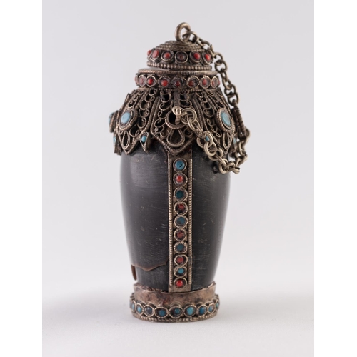 35 - A POSSIBLY HORN, WHITE METAL AND FAUX JEWEL ENCRUSTED SNUFF BOTTLE, with chain attached stopper and ... 