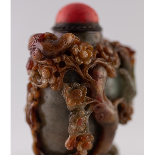 30 - A GOOD CHINESE QING DYNASTY CARVED THREE COLOUR JADE SNUFF BOTTLE the grey-green stone with russet i... 