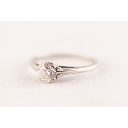 366 - PLATINUM SOLITAIRE DIAMOND RING. An old cut diamond in a double claw setting, to scroll shoulders, e... 