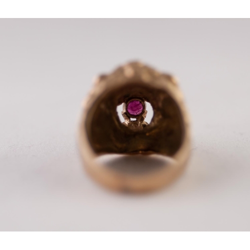 264L - 9ct GOLD RUBY LION HEAD RING. Cast as a lion head with a round ruby in the mouth, ring size P1/2, 17... 