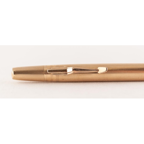 260E - ENGINE TURNED LIFE LONG PROPELLING PENCIL, stamped '9CT GOLD', 20.73g gross