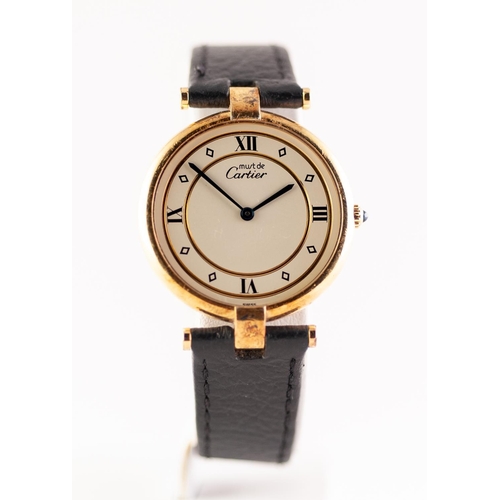 86 - MUST DE CARTIER MID-SIZE SWISS SILVER GILT WRIST WATCH with quality movement, cabochon sapphire crow... 