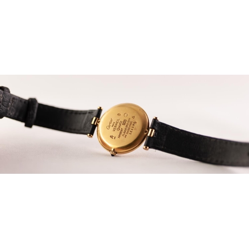 86 - MUST DE CARTIER MID-SIZE SWISS SILVER GILT WRIST WATCH with quality movement, cabochon sapphire crow... 